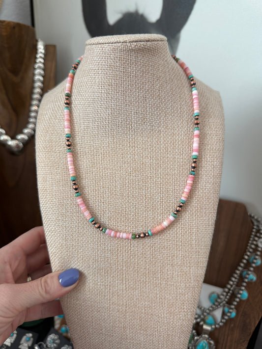 Pink conch and copper pearls 18” single strand